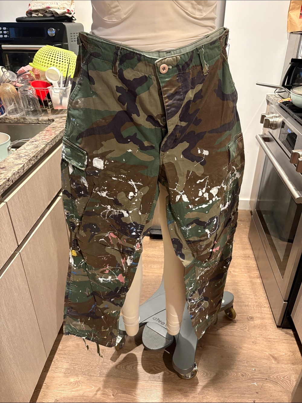 Urban Renewal Camo Cargo Pants with White Paint Splatter